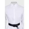 Fitted dress with a contrasting belt