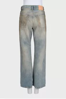 Straight-leg blue jeans with a distressed effect