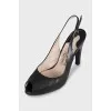 Black leather slingbacks with heels