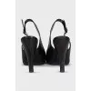 Black leather slingbacks with heels