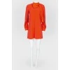 Orange dress with a decorative element