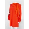 Orange dress with a decorative element