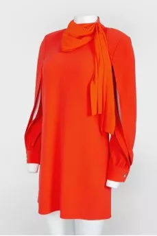 Orange dress with a decorative element