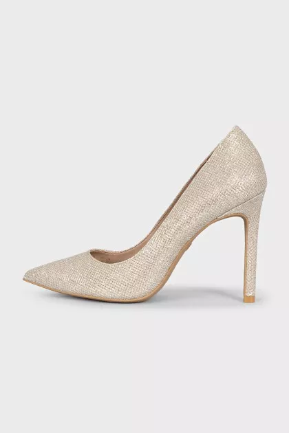 Shiny silver pumps