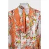 Loose floral print blouse with ties