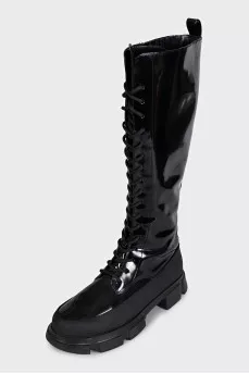 Black patent leather boots with zip and laces