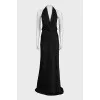 Black off-the-shoulder dress with a train