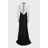 Black off-the-shoulder dress with a train