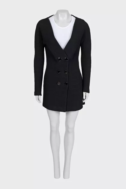 A suit consisting of a long jacket and a miniskirt