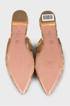 Beige mules with embroidery and pompom