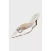 White leather mules with decoration