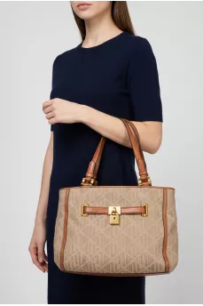Beige textile bag with leather trim