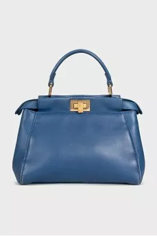 Blue leather bag with gold hardware