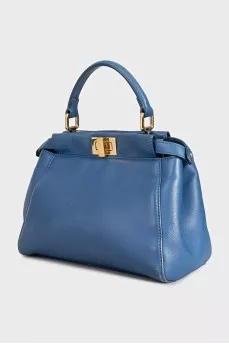 Blue leather bag with gold hardware