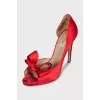 Red textile shoes with a bow