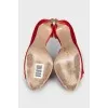 Red textile shoes with a bow