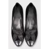 Textile shoes with leather toes and heels