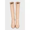 Beige leather wedge boots