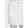 Mini skirt with patch pockets