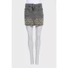 Denim mini skirt with a ripped effect