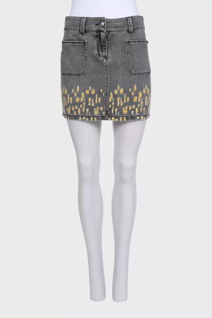 Denim mini skirt with a ripped effect