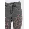 Gray skinny fit jeans with a distressed effect