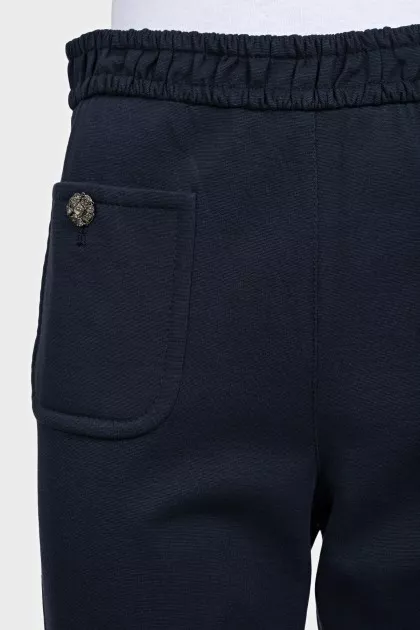 Straight trousers with a side zipper
