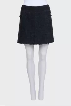 Mini skirt decorated with chains