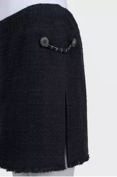 Mini skirt decorated with chains