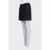 Mini skirt decorated with chains