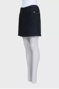Mini skirt decorated with chains