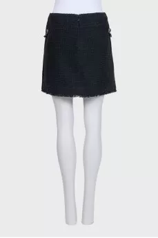 Mini skirt decorated with chains