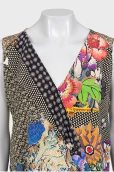 Sleeveless silk blouse with tag