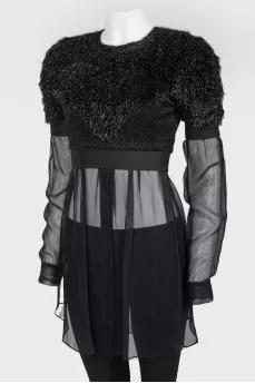 Black top with a decorative pile with a transparent bottom