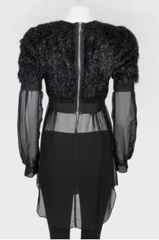 Black top with a decorative pile with a transparent bottom