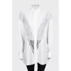 Loose-fitting blouse with perforations