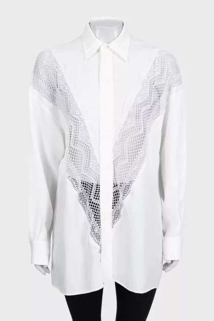 Loose-fitting blouse with perforations
