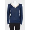 Dark blue longshit with a beige strip on the neck
