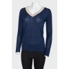 Dark blue longshit with a beige strip on the neck