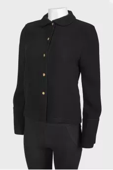 Black blouse with golden buttons in the form of flowers