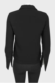 Black blouse with golden buttons in the form of flowers