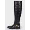 Tall black boots with logo