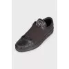Men's brown leather sneakers with silver logo