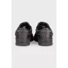 Men's brown leather sneakers with silver logo