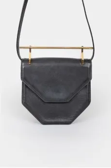 Leather curly bag with a metal handle