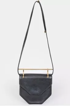 Leather curly bag with a metal handle