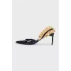 Leather slingbacks with embellishments on the back