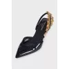 Leather slingbacks with embellishments on the back