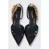 Leather slingbacks with embellishments on the back