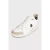 White sneakers with logo